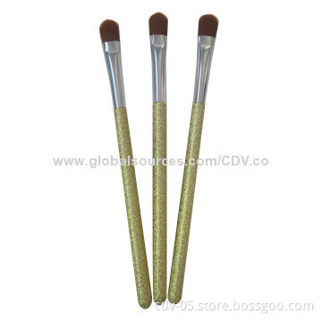Eyeshadow makeup brush made of plastic handle with glittery finish, aluminum ferrule, synthetic hair